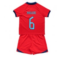 Engleska Harry Maguire #6 Koszulka Wyjazdowa dzieci MŚ 2022 Krótki Rękaw (+ krótkie spodenki)