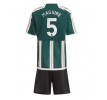 Manchester United Harry Maguire #5 Koszulka Wyjazdowa dzieci 2023-24 Krótki Rękaw (+ krótkie spodenki)