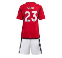 Manchester United Luke Shaw #23 Koszulka Podstawowa dzieci 2023-24 Krótki Rękaw (+ krótkie spodenki)