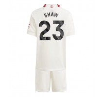 Manchester United Luke Shaw #23 Koszulka Trzecia dzieci 2023-24 Krótki Rękaw (+ krótkie spodenki)