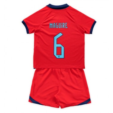 Engleska Harry Maguire #6 Koszulka Wyjazdowa dzieci MŚ 2022 Krótki Rękaw (+ krótkie spodenki)