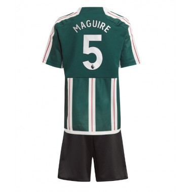 Manchester United Harry Maguire #5 Koszulka Wyjazdowa dzieci 2023-24 Krótki Rękaw (+ krótkie spodenki)