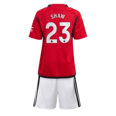 Manchester United Luke Shaw #23 Koszulka Podstawowa dzieci 2023-24 Krótki Rękaw (+ krótkie spodenki)