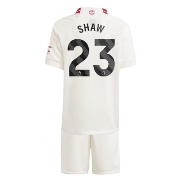 Manchester United Luke Shaw #23 Koszulka Trzecia dzieci 2023-24 Krótki Rękaw (+ krótkie spodenki)